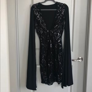 Black long sleeve sequin dress. Worn once.